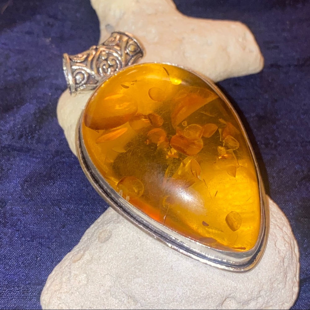 Vintage Style Teardrop Amber Pendant in 925 Sterling Silver Setting.